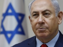 Israel’s Netanyahu looks to exude calm in face of charges